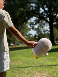 Puddles the Pink Penguin - Cuddle Cart outside in park
